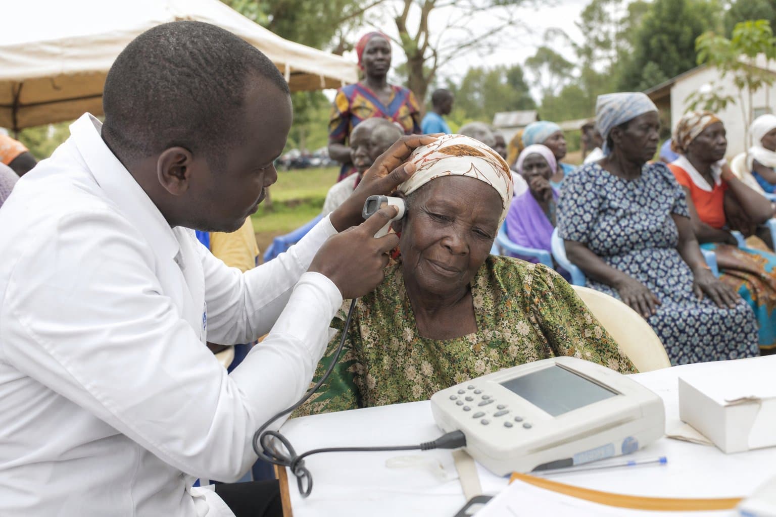 A child undergoes a free hearing screening test.
